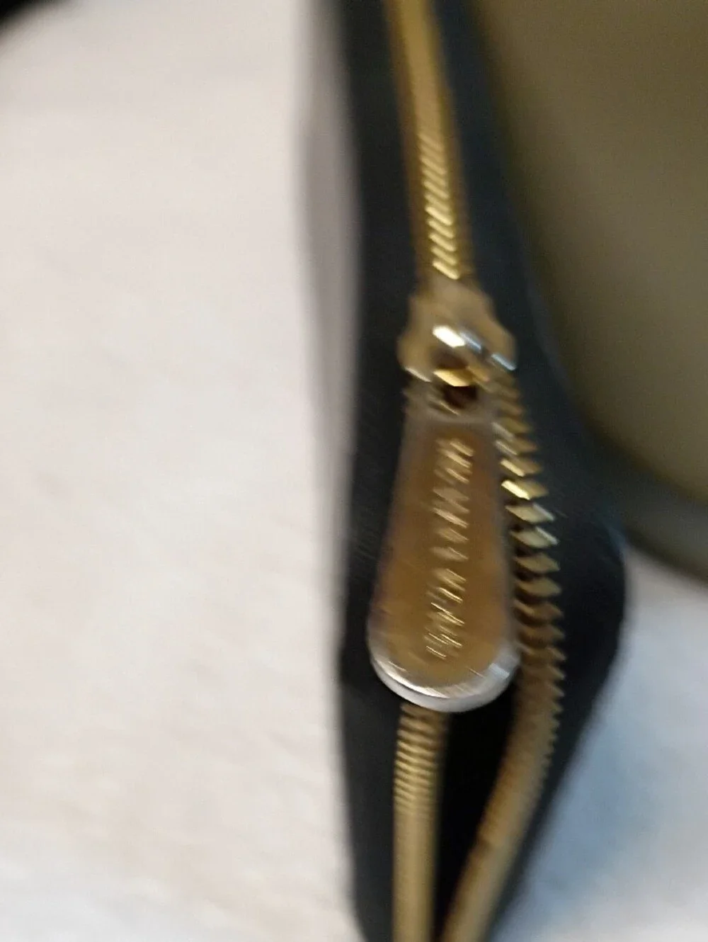 Michael Kors Black Zip-Around Saffiano Wallet with Gold Logo